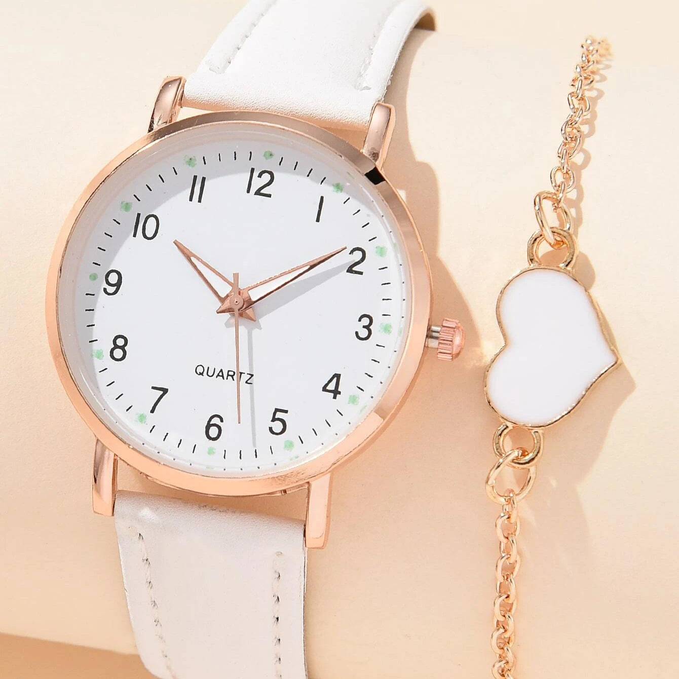 Stylische Quartz Armbanduhr + gratis Armband. Ideal für Frauen.