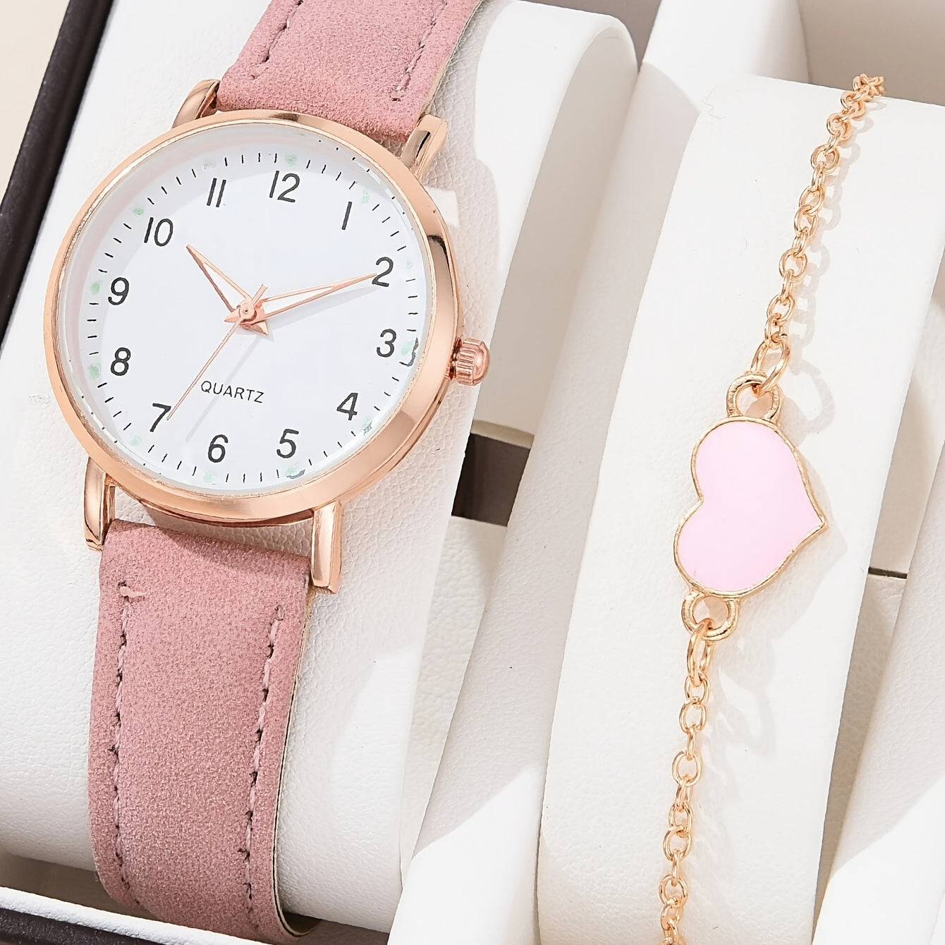 Stylische Quartz Armbanduhr + gratis Armband. Ideal für Frauen.