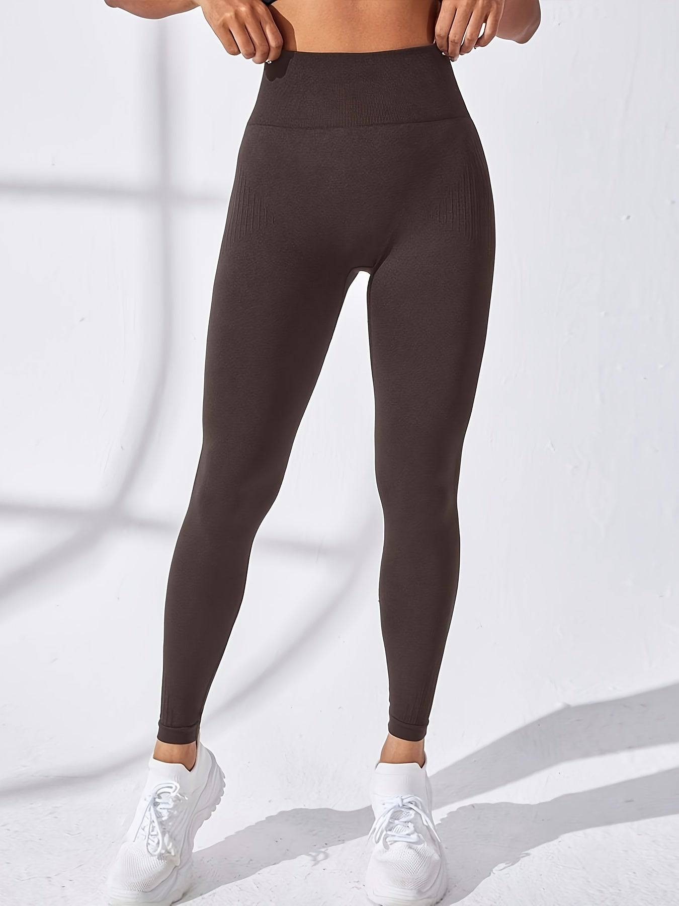 Hoch taillierte einfarbige Leggings für Fitness und Yoga.