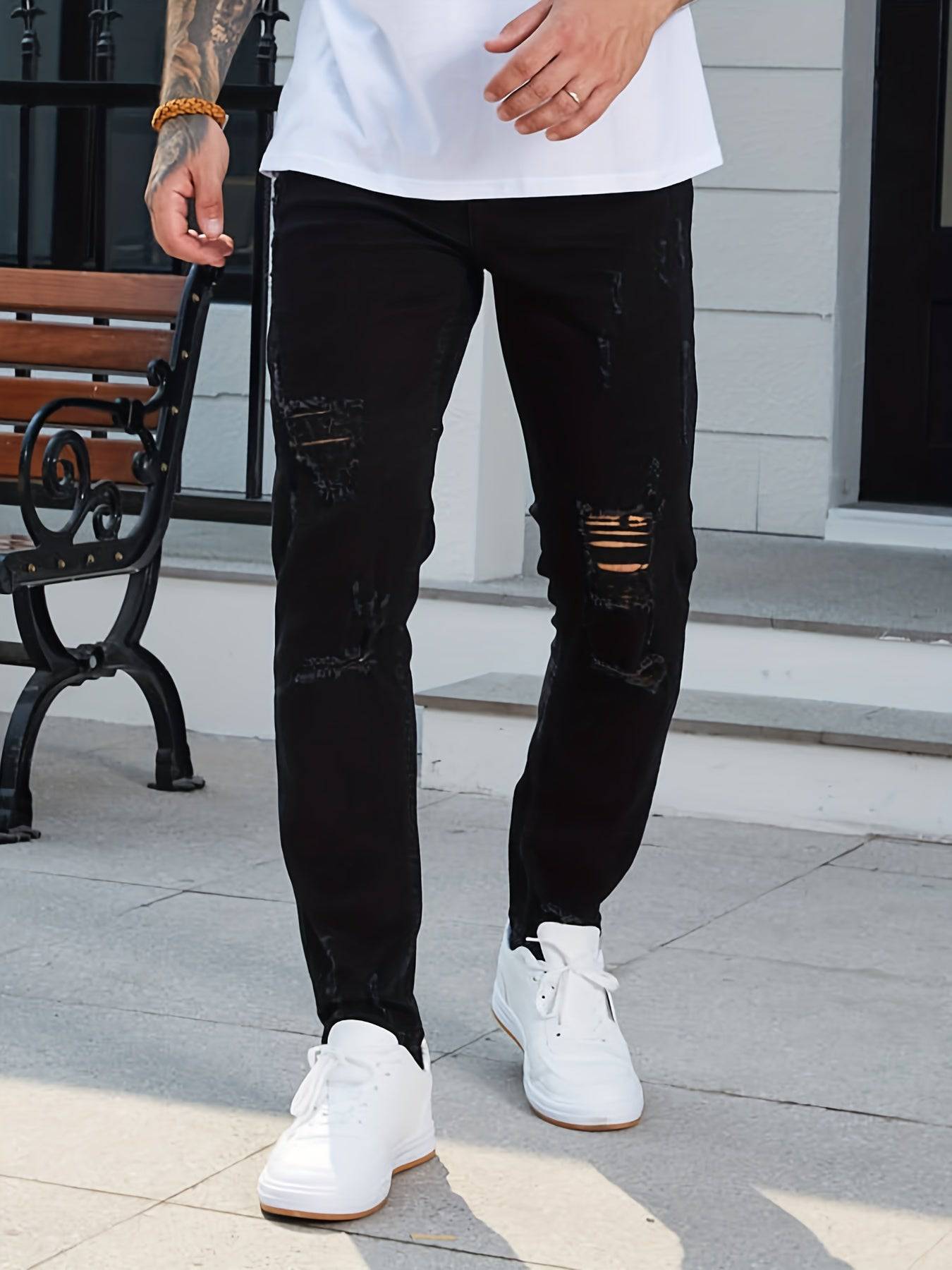 Zerrissene Slim Fit Jeans für den lässig-stilvollen Mann.