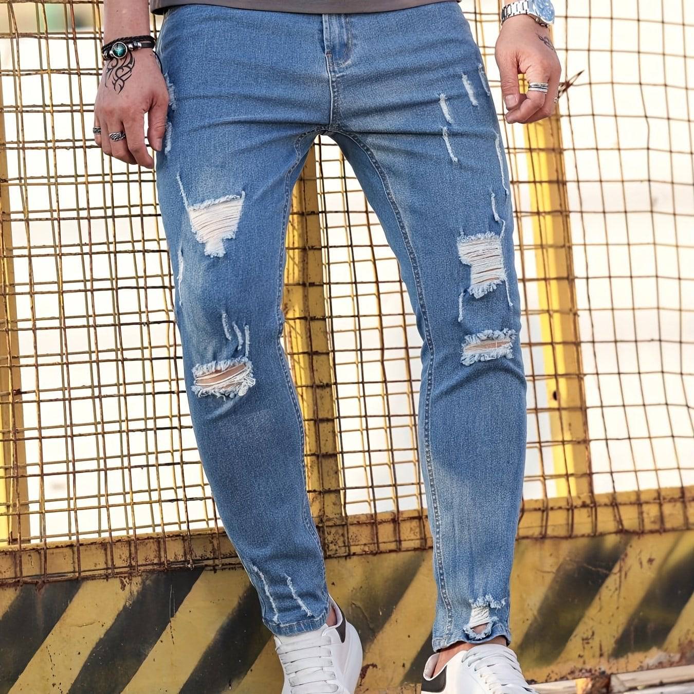 Zerrissene Slim Fit Jeans für den lässig-stilvollen Mann.