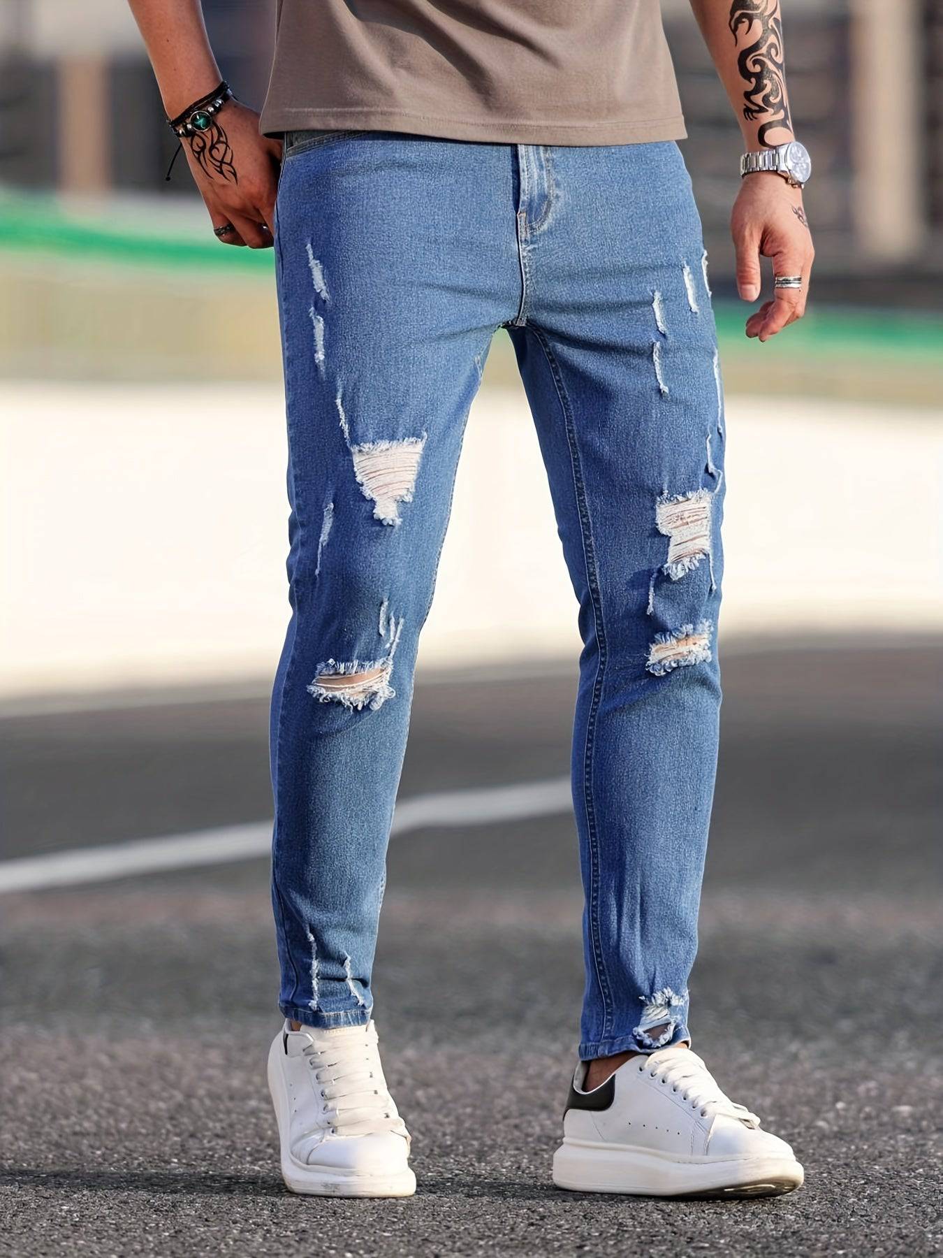 Zerrissene Slim Fit Jeans für den lässig-stilvollen Mann.