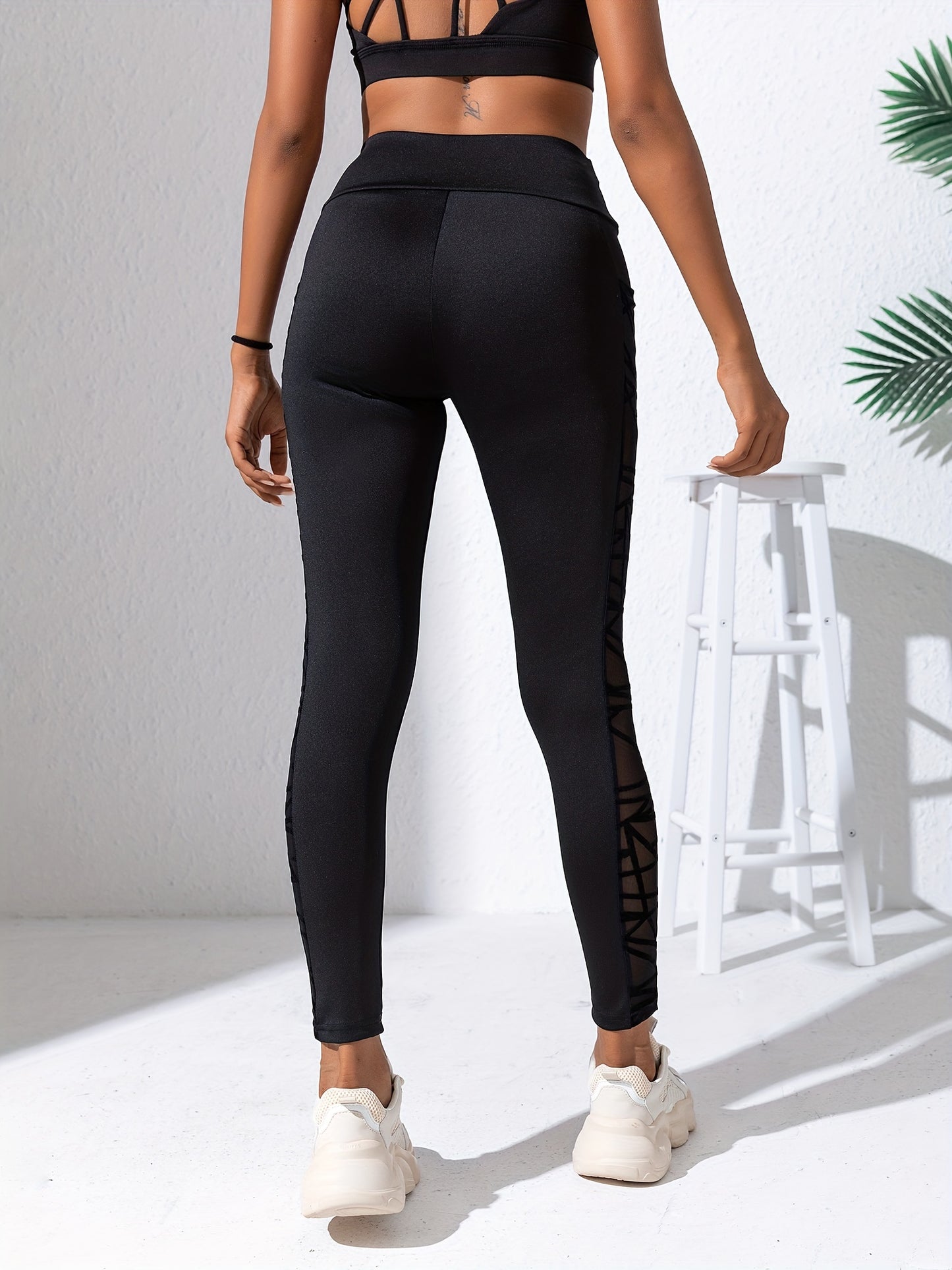 Schwarze Netz-Sticktaschen-Sportleggings - Snatch
