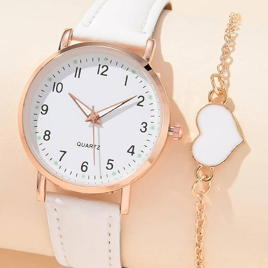 Stylische Quartz Armbanduhr + gratis Armband. Ideal für Frauen.