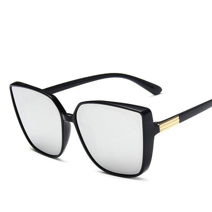 Fashion Square Sonnenbrille Frauen - Oversize Rahmen, Katzenauge, Vintage Look.

Neuer Titel: Trendige Vintage Sonnenbrille - Oversize Rahmen, Katzenaugen