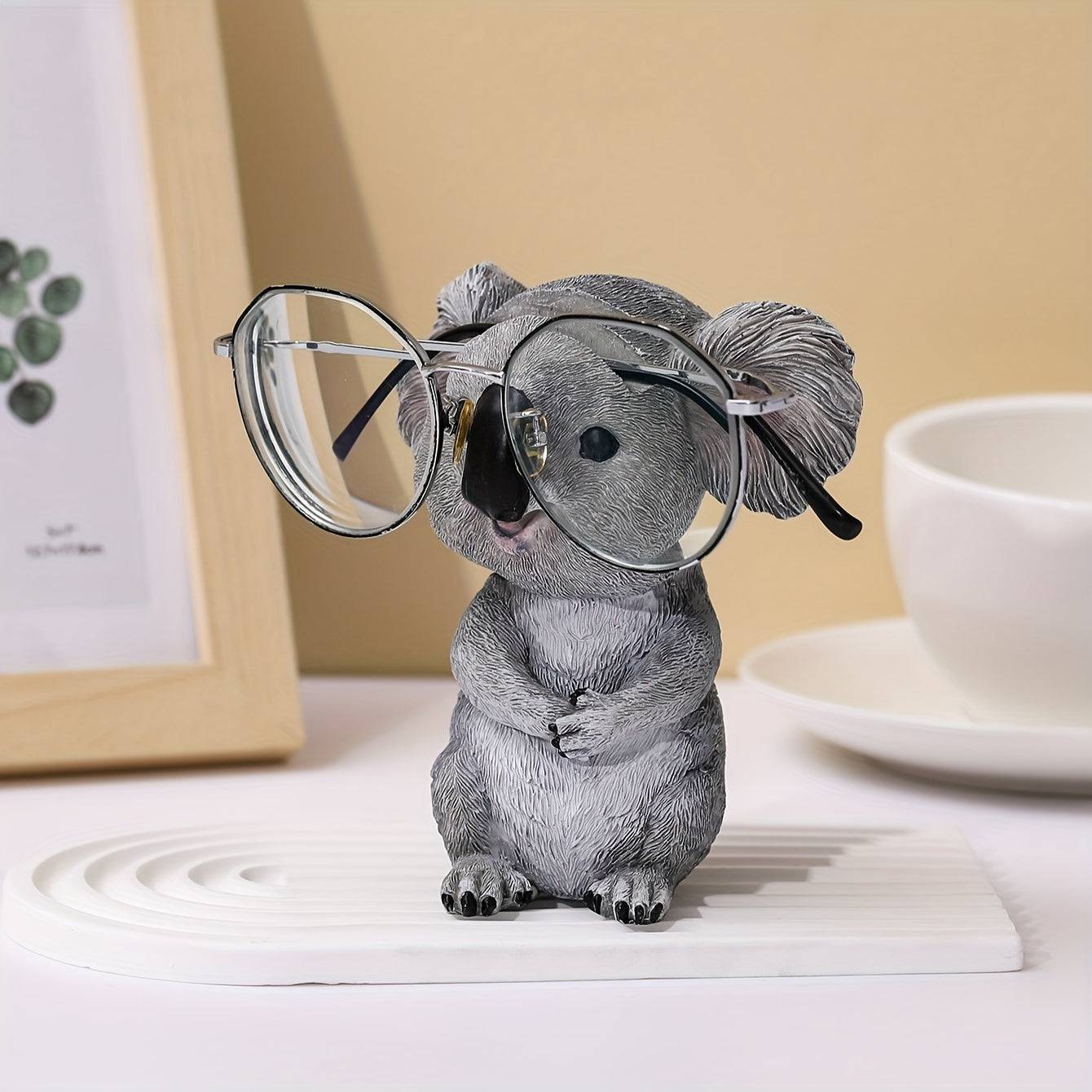 1pc Koala Ornament - Brillenhalter, Harzstatue für Bücherregal Wohnzimmer Büro Cafe Dekor, Winter Weihnachten Neujahr Dekor. 

Neuer Titel: Koala Ornament - Brillenhalter, Harzstatue für vielseitiges Wohnraumdekor.