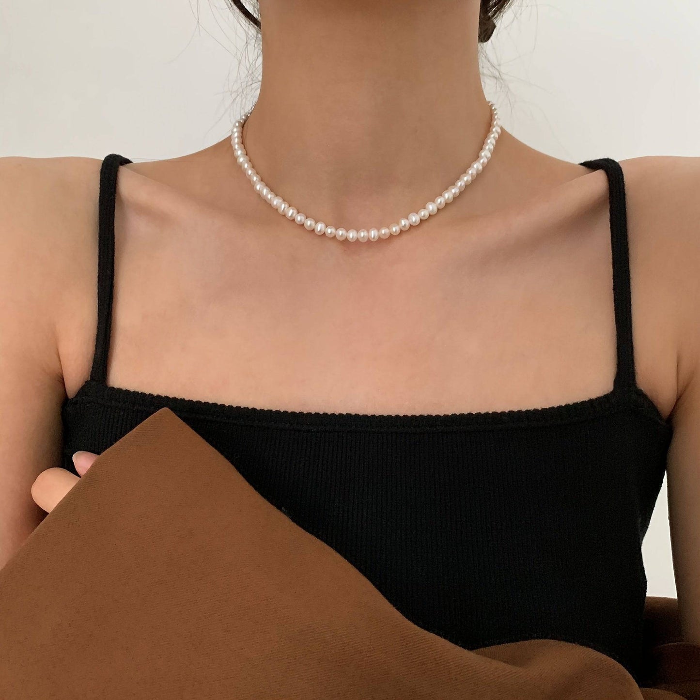 Elegante Faux Perle Halskette - Für stilvollen Urlaubsschmuck.